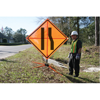 Tilt-Adjust Merge Left Roll-Up Construction Sign, 36" x 36", Vinyl, Pictogram NRZ Safety Inc.